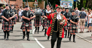 town crier leads parade