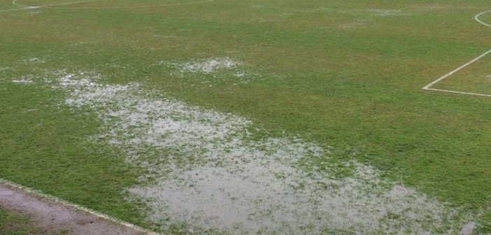 waterlogged pitch