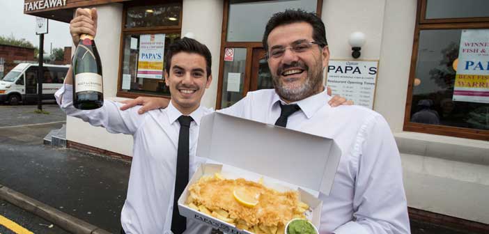 Staff at Warrington's Papa's Fish & Chips celebrate