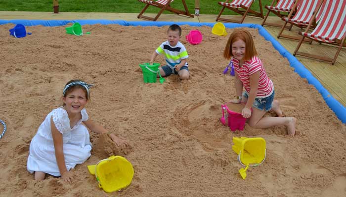 Youngsters enjoying the sand