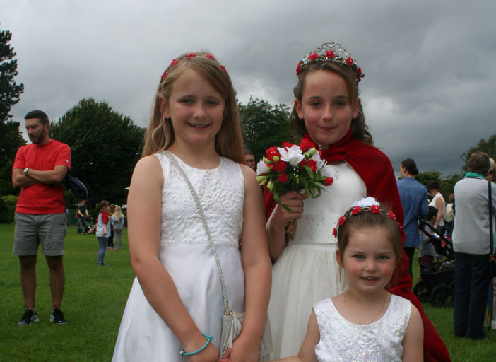 St Thomas' Sunday Rose Queen Amelia Smith aged 9, with attendants Bella Thornton (8) and Alice Emery (4).