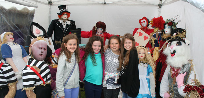 youngsters-with-scarecrows