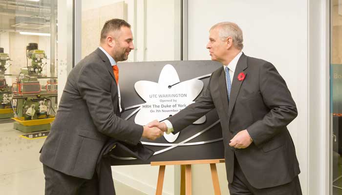 Prince Andrew is welcomed by principal Lee Barber - Picture Jim Hunter