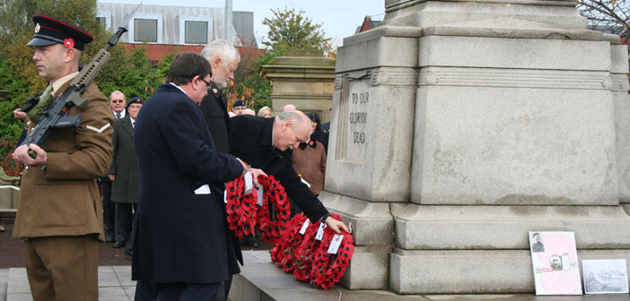 Deputy leader of the council Graham Friend lays a wreath