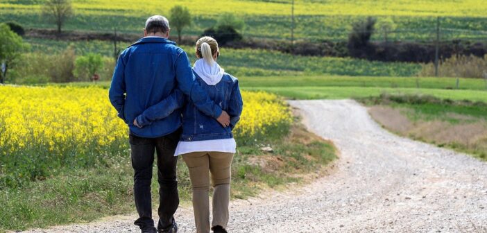couple walking down path - talking about intimacy issues importance