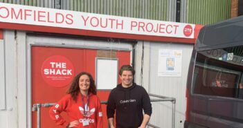 Grace and Work to Live Sponsor Ian Richards in front of The Shack