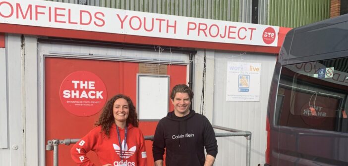 Grace and Work to Live Sponsor Ian Richards in front of The Shack