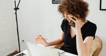 woman on phone side hustle