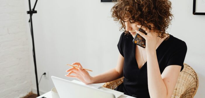 woman on phone side hustle