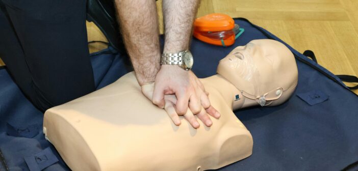 Delegates practising first aid skills during an accredited workplace training course